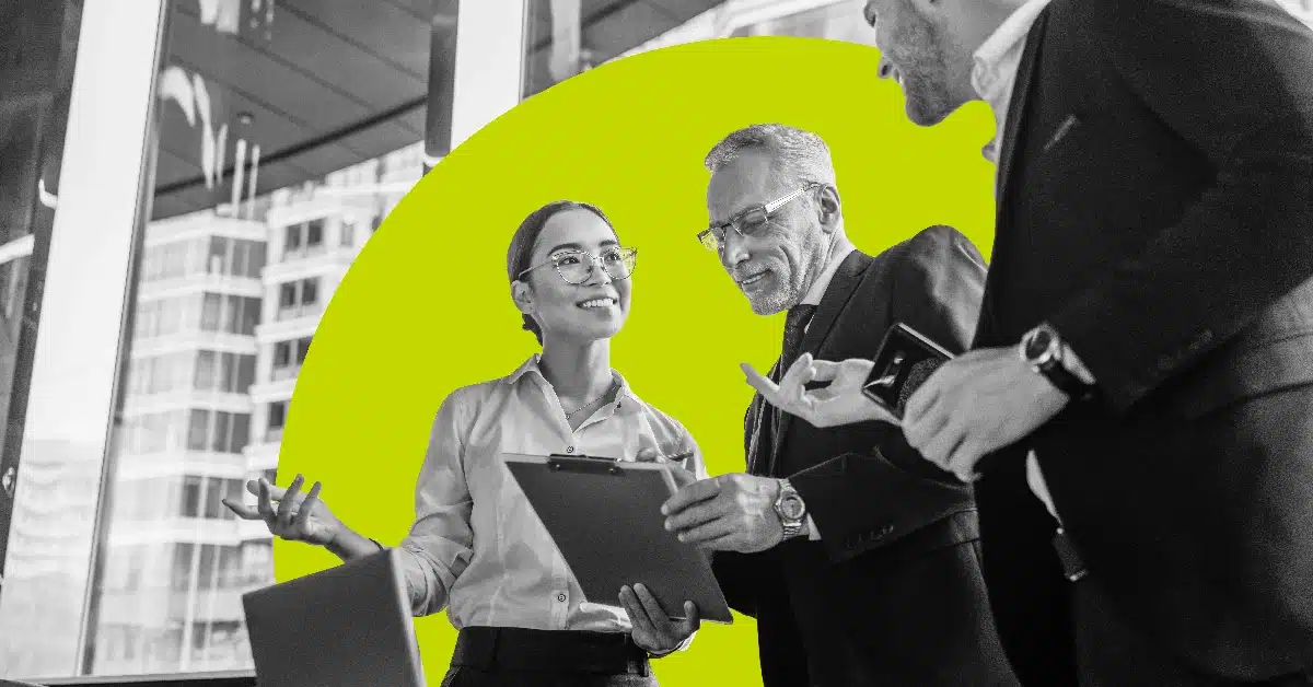 Three B2b marketers discussing a campaign.