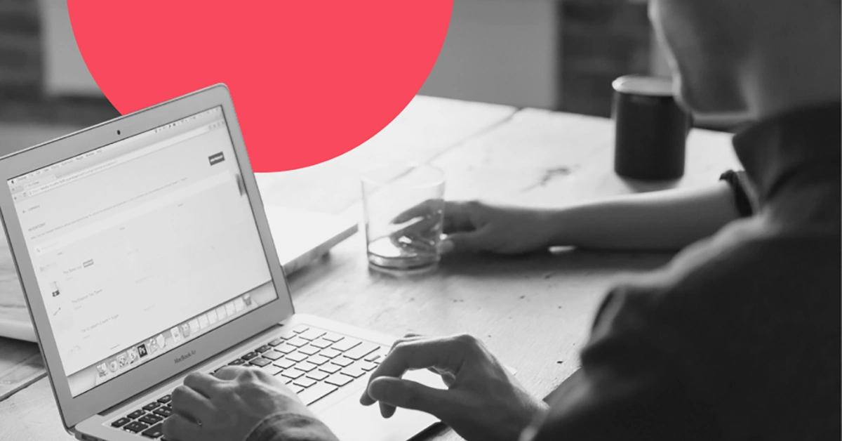 Looking at B2B marketing metrics on a computer.