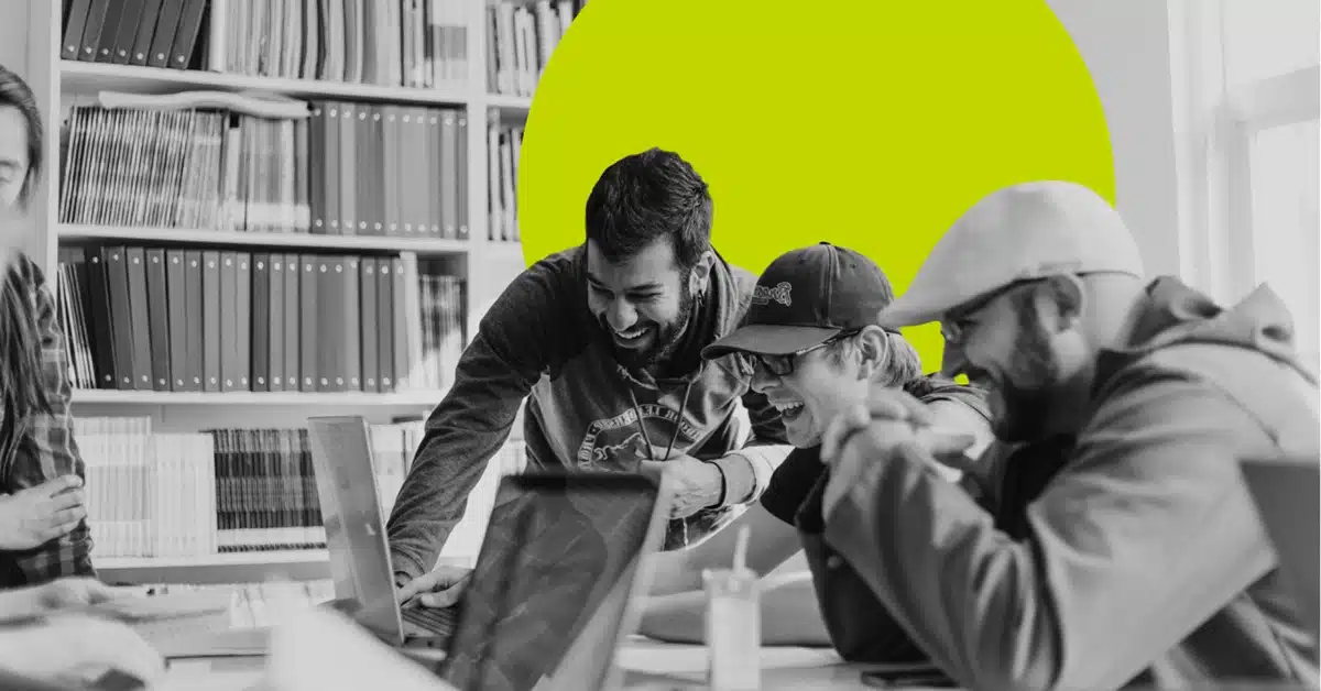 Three colleagues work on a customer rewards program.