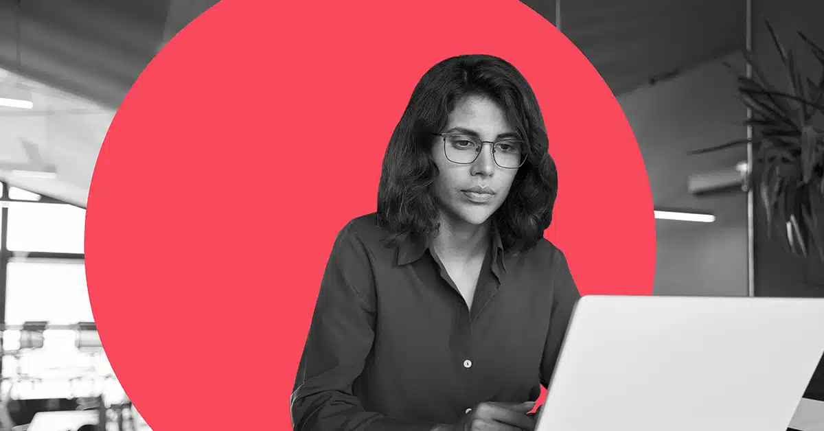 A woman working on welcome email series.