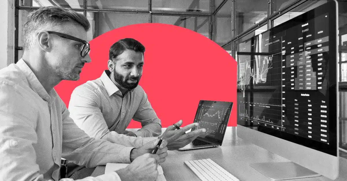 Two men discussing FINRA compliance.