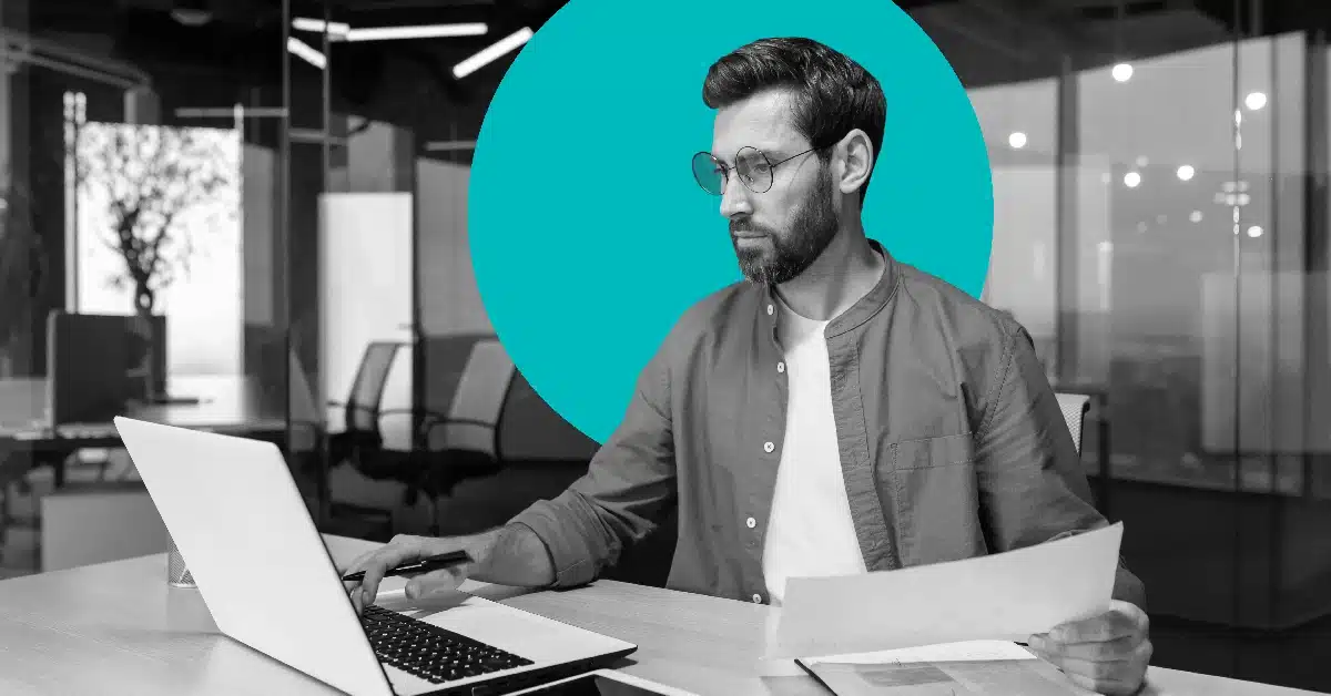 Man exploring LinkedIn marketing groups on a laptop.