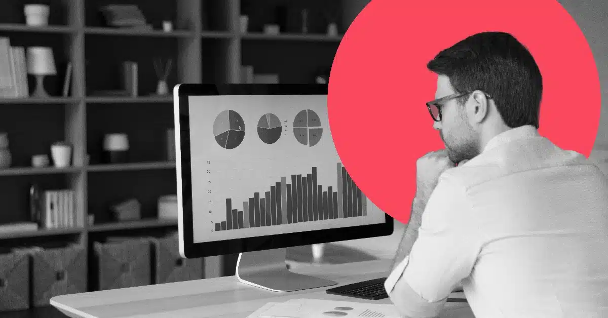 Man going over marketing automation statistics on a computer.