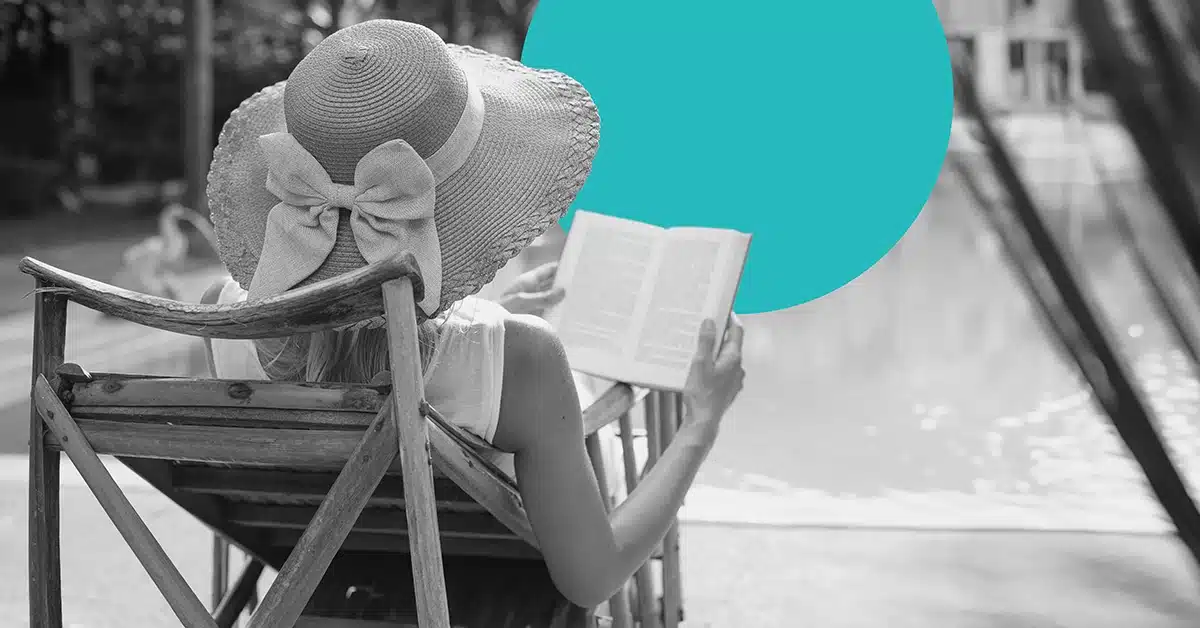 Woman reading one of the best marketing books.