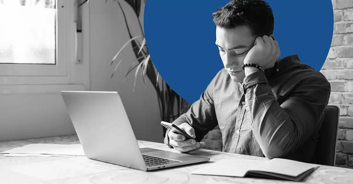 Man looks bored as he received an SMS marketing message.